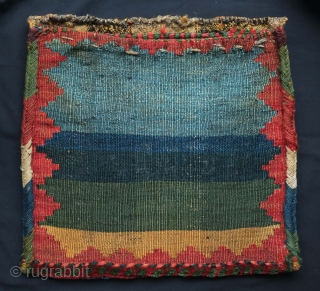 Qashqa'i complete bag, 19th century.  You can feel the lanolin in the plush wool pile.  Mezmerizing kilim back.  41 x 39 cm.  Contact danauger@tribalgardenrugs.com     