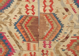 Fethiye Area Kilim, mid-9th century. Good colors with a soft green and a rich apricot. Archaic drawing. Corrosion of the browns. 150 x 340 cm. Contact danauger@tribalgardenrugs.com
      