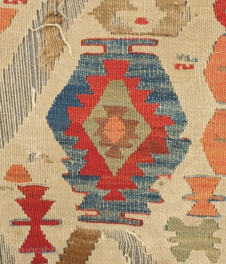 Fethiye Area Kilim, mid-9th century. Good colors with a soft green and a rich apricot. Archaic drawing. Corrosion of the browns. 150 x 340 cm. Contact danauger@tribalgardenrugs.com
      