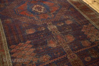 Timuri Belouch Garden carpet, 1800s. Worn and used but with phenomenal design. Electric blue. Early piece, big size, cochineal reds. 4'8" x 8'4". Contact for more info.      