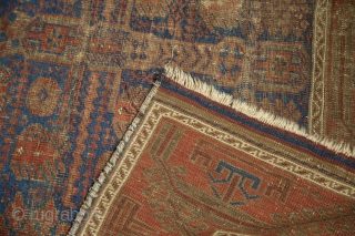 Timuri Belouch Garden carpet, 1800s. Worn and used but with phenomenal design. Electric blue. Early piece, big size, cochineal reds. 4'8" x 8'4". Contact for more info.      