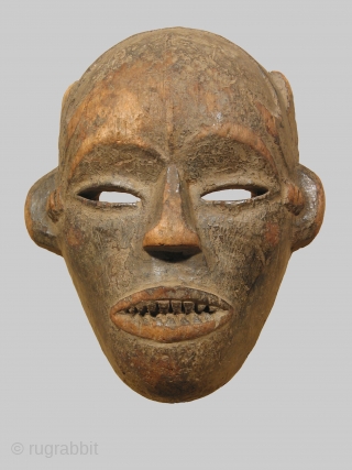 Ibo mask, Nigeria, an early archaic wood mask of the Lughielu type from the Alayi ibo subgroup in Ugwu Eke village, 8 inches high, 19th or early 20th century. Ex col. Sulaimane  ...