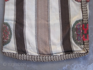 Karapinar Cargo / Grain Storage bag.....Konya area in Central Anatolia....
1st half 20th C...all wool with plaited strap and felt 'grips '..... 2' x 3'4" (60cm x 100cm )....very good condition with some  ...