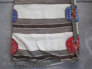 Large Karapinar Cargo/ Storage bag....Central Anatolia...first half 20th C...
excellent condition as shown...2'7" x 5'2" (80cm x 160cm )...all un-dyed wool...
a tight balanced plain-weave ground with extra-weft patterning , felt'grips' w/ embroidery and  ...