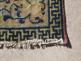 Chinese.....18th Century...28" x 29" (71cm x 74cm )....missing one end , with
overall low pile .....opposing Phoenixes in center , but they are difficult to see ....condition as shown and priced accordingly.   ...