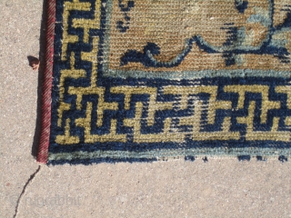 Chinese.....18th Century...28" x 29" (71cm x 74cm )....missing one end , with
overall low pile .....opposing Phoenixes in center , but they are difficult to see ....condition as shown and priced accordingly.   ...