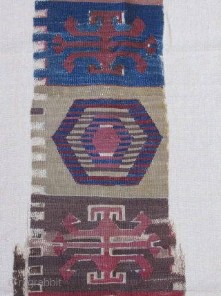 Anatolian kilim border fragment....Southeast Anatolia ( Reyhanli ? Kurdish ?) before 1825....wool w/ cotton-ground end-panel...very fine weave....frag. size 1'4" x 5"( 40 x 155 cm) ....unusual archaic motif drawings...professionally mounted on linen....condition  ...