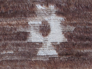 Central Anatolia...Karapinar Tulu Yatak (4'6" x 6'3") (140 x 190cm )....wool and Angora goat-hair...circa 1910....fair condition as shown with worn areas and (2) patches .        