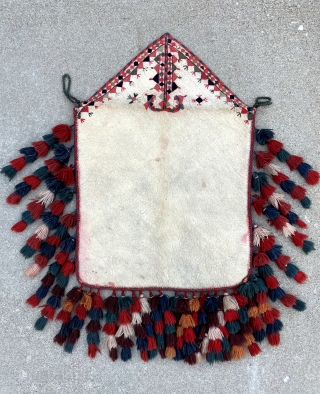 Early 1900s Yomut felt bokche. In great condition minus a few red runs near the border. 1'10" x 2'0".              