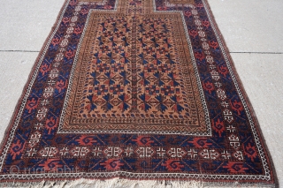 Wonderful 19th century Antique Baluch prayer rug. It's mostly medium pile with some colors which have corroded over the years. Soft wool. Rare with the rosettes on the main tree of life  ...