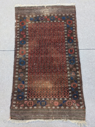 Fun little old Baluch. Great for use as a scatter rug or any space. Love that glowing red field to outline the botehs. 

5ft6in x 3ft1in or 168 x 94cm

Low pile, one  ...