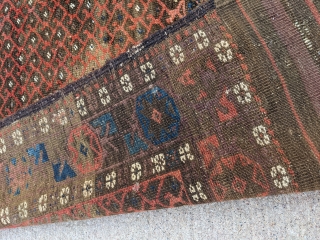 Fun little old Baluch. Great for use as a scatter rug or any space. Love that glowing red field to outline the botehs. 

5ft6in x 3ft1in or 168 x 94cm

Low pile, one  ...