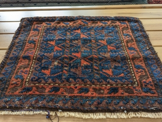 Timuri Baluch chanteh. The light blues really shine in the light. Good soft wool and oxidized browns. 1'5" x 1'9". Contact me at: steven.malloch@gmail.com or gerrerugs@gmail.com       