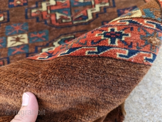 19th century Yomut chuval. Great condition with good saturated, natural colors. Beautiful brown and the back shows it's am old one. 2'5" x 3'8"         
