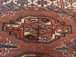 Nice 19th century Yomud chuval with good colors, indigo, green, and highlights of yellow. No holes or repairs besides the usual top corners where the draw strings would have been. These were  ...