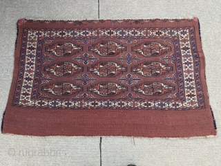 Nice 19th century Yomud chuval with good colors, indigo, green, and highlights of yellow. No holes or repairs besides the usual top corners where the draw strings would have been. These were  ...