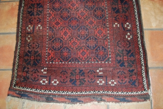 Old Baluch rug, 89 x 175 cm, condition issues (one tear 10 cm)                    