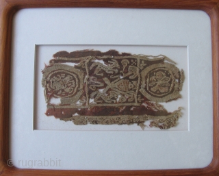 Coptic Tapestry Fragment,  Mounted behind plexi.  3.5 x 7 inches, frame size 9 x 11 inches.               