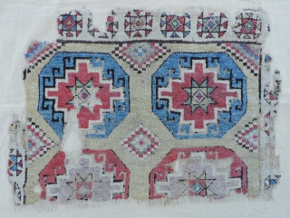 Central Anatolian Yellow Ground Konya Fragment with Memling guls. Fluffy pile, large knots, soft wool circa 1800 or before. Lighter palette than most others of the type. Mounted to linen cloth.   ...