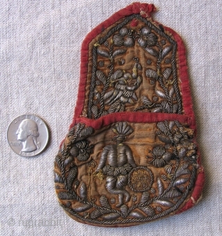 One of a kind small Colonial period pouch. Bolivia or Peru. 18th century possibly earlier. Silver wrapped silk thread embroidery on a silk velvet ground that shows a Spanish (Europeanized) idealization of  ...