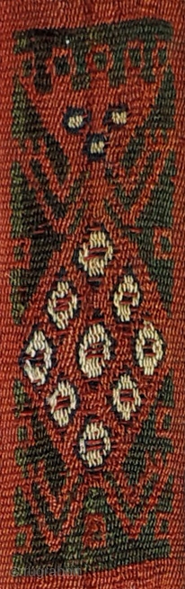 Pre-Columbian sash. Complete. Warp-faced, double cloth band woven in alpaca fiber.  Size: 1.5 inches x 13 feet.  A.D. 1000 - 1400.  Design of alternating zoomorphic/anthromorphic figures.  Finely woven  ...