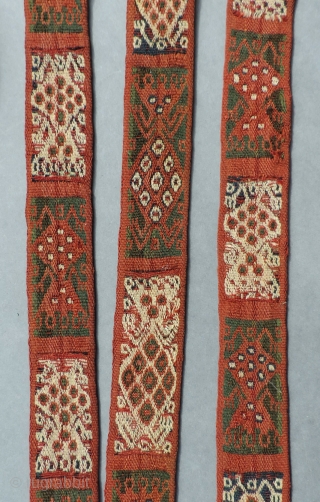 Pre-Columbian sash. Complete. Warp-faced, double cloth band woven in alpaca fiber.  Size: 1.5 inches x 13 feet.  A.D. 1000 - 1400.  Design of alternating zoomorphic/anthromorphic figures.  Finely woven  ...