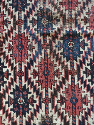(probably) Baluch with asmalyk designs.  Third quarter 19th century.  Extremely good wools.  Unfortunately rug is badly worn, with a repaired hole and substantial wear.  However, the goat hair  ...