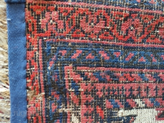 (probably) Baluch with asmalyk designs.  Third quarter 19th century.  Extremely good wools.  Unfortunately rug is badly worn, with a repaired hole and substantial wear.  However, the goat hair  ...
