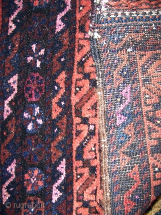 Baluch khorjin.  Saturated colors and complex kelim ends.  Ends and edges of bridge part have wear, but full pile otherwise.           