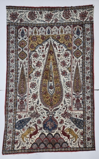 Kalamkari Palampore from South India. India. 
Hand-Drawn Mordant-And Resist-Dyed Cotton, with exotic birds, peacocks, tigers, stylized mountain and cypress trees all within mihrab.

Made for Export Market, 

Late 19th Early 20th Century. 

Its  ...