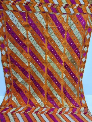 An Unique Bagh-Phulkari From East (Punjab) India. Floss Silk on Hand Spun Cotton khaddar Cloth. 

Late 19th Century. 

Its size is 138cmX215cm

(20230325_115225).           