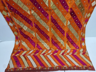 An Unique Bagh-Phulkari From East (Punjab) India. Floss Silk on Hand Spun Cotton khaddar Cloth. 

Late 19th Century. 

Its size is 138cmX215cm

(20230325_115225).           