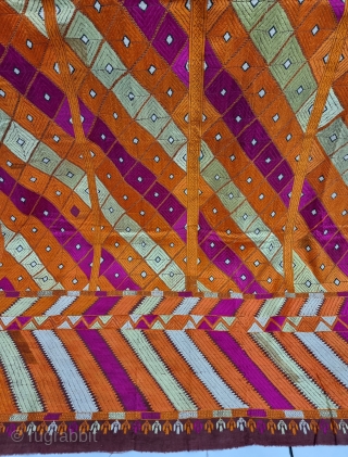 An Unique Bagh-Phulkari From East (Punjab) India. Floss Silk on Hand Spun Cotton khaddar Cloth. 

Late 19th Century. 

Its size is 138cmX215cm

(20230325_115225).           