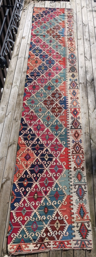 From Sonny Berntssons collection:
No 160 Sivrihisar kilim (half) 71 x 410 cm  circa 1850
Some holes as can be seen on photo.
More innfo if you ask.
NOTE: E-mails are not always delivered to  ...
