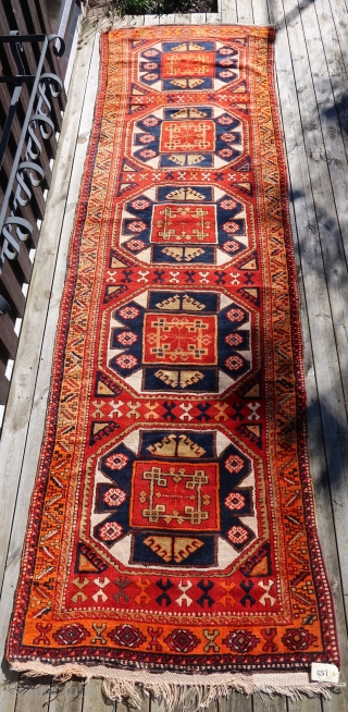 From Sonny Berntssons collection:
No 155 Adiyaman divan EA kurdish rug.
Sony estimated it to circa 1890.
The orange colour is syntetic, maybe also some red, but it is a lovely item.
Size: 99 x 345  ...
