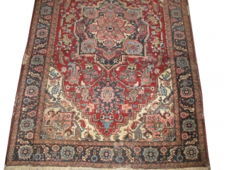 

Heriz Persian, knotted circa 1920 antique, 287 x 190 cm, carpet ID: P-5001
The black knots are oxidized, the knots are hand spun wool, the center medallion and the border are indigo, rust  ...