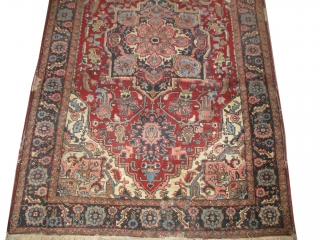 

Heriz Persian, knotted circa 1920 antique, 287 x 190 cm, carpet ID: P-5001
The black knots are oxidized, the knots are hand spun wool, the center medallion and the border are indigo, rust  ...
