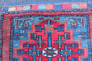 Very fine Caucasian? bagface. Very finely woven with a very thin red weft. Great colors and bold graphic design. Size is 2' x 2'. One small reweaving at bottom. See picture with  ...