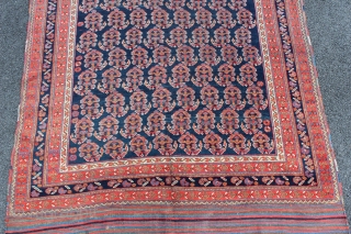Afshar Neriz Main Rug 4'9" x 9'6". Third to fourth quarter Nineteenth Century. There is a sewn tear on one kilim end. There is one fold wear. There is one old stain.  ...