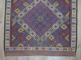 Eastern Kurdish kilim. Circa 1950. Wool on cotton. Good condition.

Size: 147 cm x 231 cm (58” x 91”).               