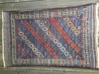 Antique Baluch rug, most likely 4th Qtr 19th century. Unusual diagonal field pattern with all natural colors including an outstanding purple. Size: 4'10"X 3'1". Soft, thin blanket-like handle and glossy wool. Medium  ...