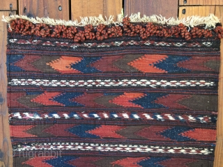 Antique Baluch Kilim which appears to be a bagface to a grainbag. Very good condition and retains closure loops. Measures 42"X 22". Hand washed. Shipping included in price.     