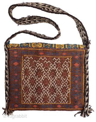 This Qashqai bag has been woven with wool dyed with natural colours. The back of the bag has some interesting motifS. The woolen handle is a latter addition and can be easily  ...