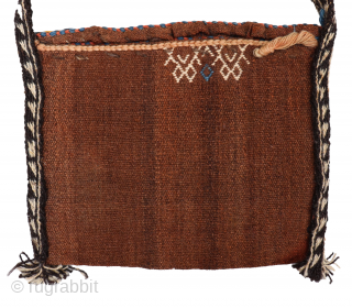 This Qashqai bag has been woven with wool dyed with natural colours. The back of the bag has some interesting motifS. The woolen handle is a latter addition and can be easily  ...