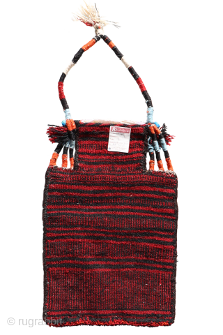 A Bakhtiari salt bag woven with the soumak technique. Some blue ceramic beads have been added as protection against evil eye. Natural dyes.

You can buy this salt bag directly from our web:  ...