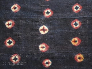 Tigma monastery runner  "Nambu" fragment cod. 0722. Tied-dyed wool plain weave. Tibet. Circa 1850 or earlier. Good condition with some holes, patches, rewoven. Cm. 84 x 140 (33” x 55”).  