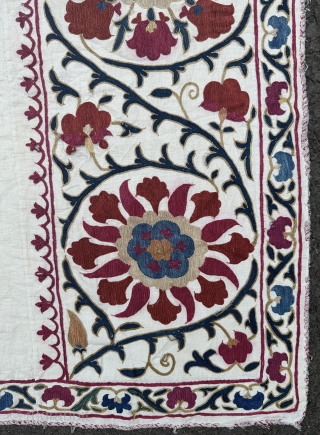 Beautiful antique Uzbek prayer arch nim suzani. 19th century. 151x90cm. Extra fine embroidery and richly dyed colours. Good condition apart from a few minor spots of edge damage. Email enquiries to owenrugs@gmail.com 