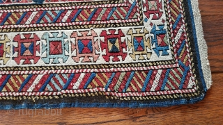Antique Kuba carpet. Lesghi star design.
The half star is original.  The rug was not cut and spliced.
Uniform medium pile.  Professional repair of pucker in border. 
36 inches wide by 76  ...