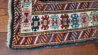 Antique Kuba carpet. Lesghi star design.
The half star is original.  The rug was not cut and spliced.
Uniform medium pile.  Professional repair of pucker in border. 
36 inches wide by 76  ...