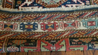 Antique Kuba carpet. Lesghi star design.
The half star is original.  The rug was not cut and spliced.
Uniform medium pile.  Professional repair of pucker in border. 
36 inches wide by 76  ...